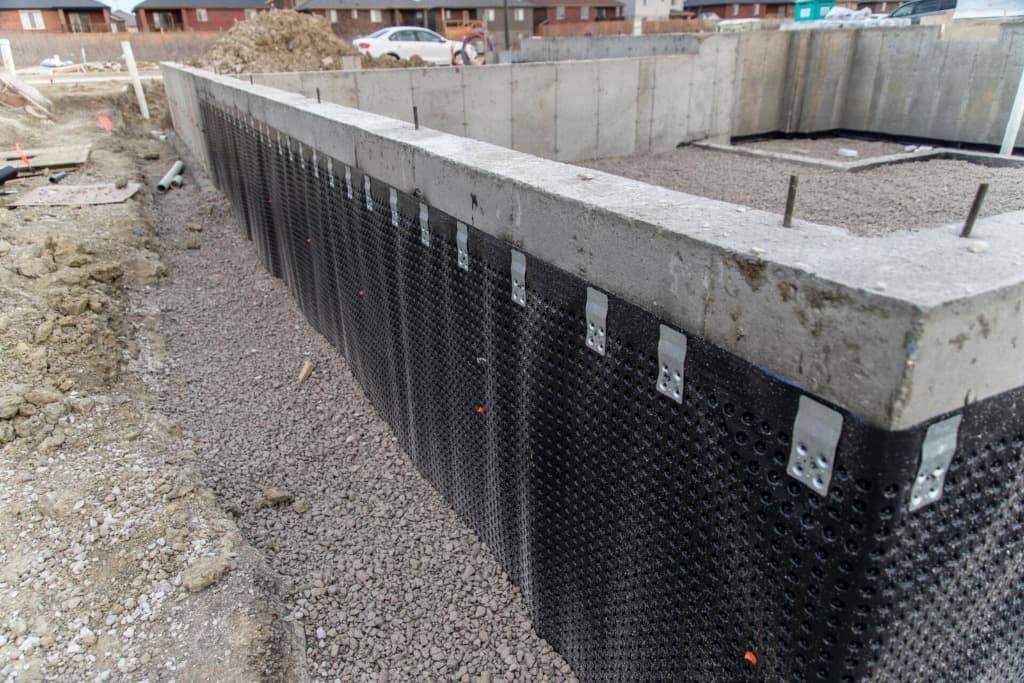 Foundation waterproofing with dimple board membrane